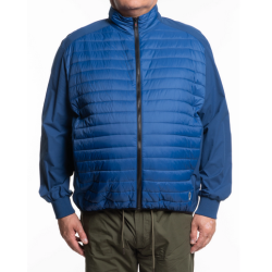 Modello piumino Chiusura frontale con zip busto con inserti leggera imbottitura maniche e fianchi senza imbottitura Fondo elasti