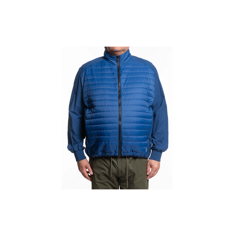 Modello piumino Chiusura frontale con zip busto con inserti leggera imbottitura maniche e fianchi senza imbottitura Fondo elasti